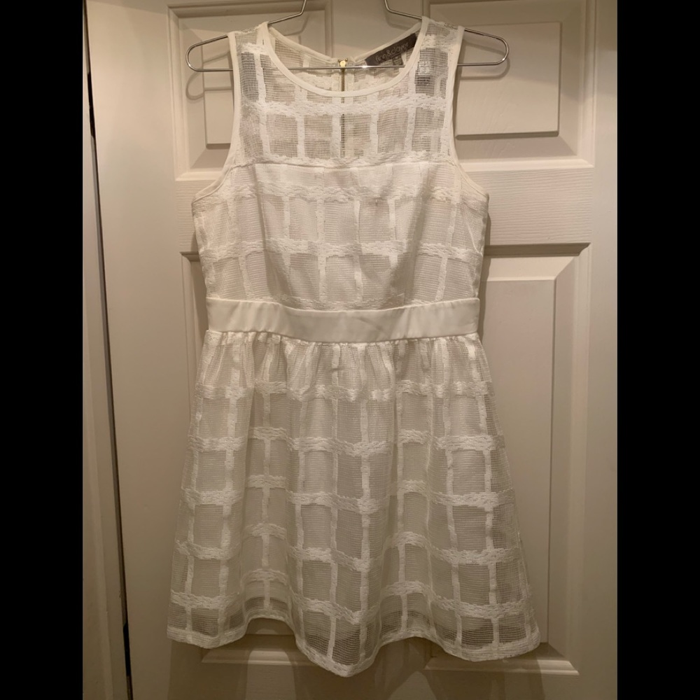 White sleeveless skater dress